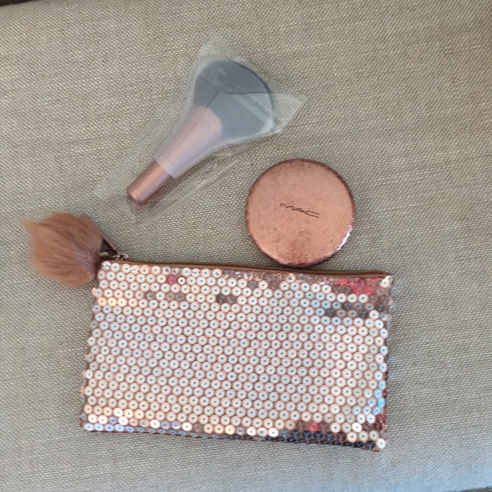 MAC snowball face bag in gold.